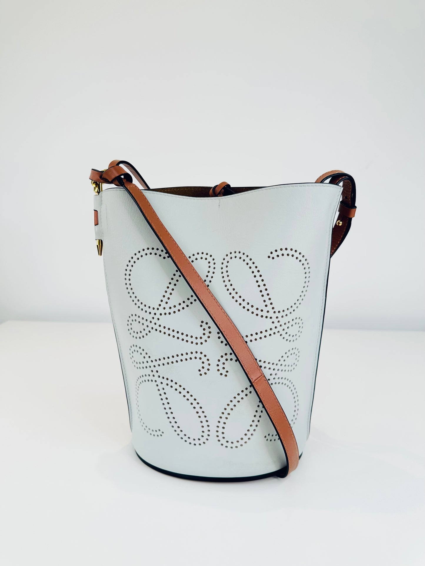 Gate Anagram Perforated Leather Bucket Bag