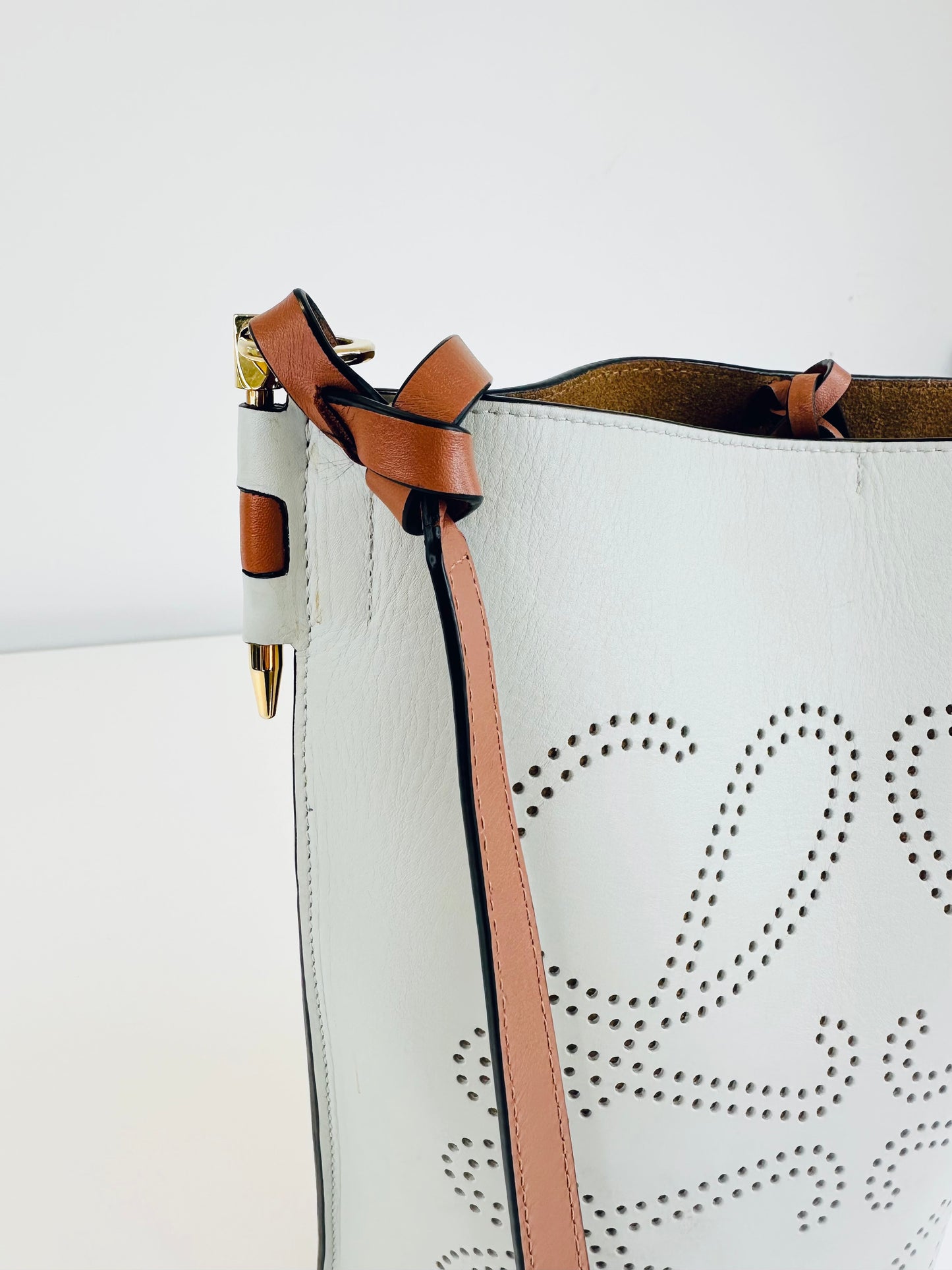 Gate Anagram Perforated Leather Bucket Bag