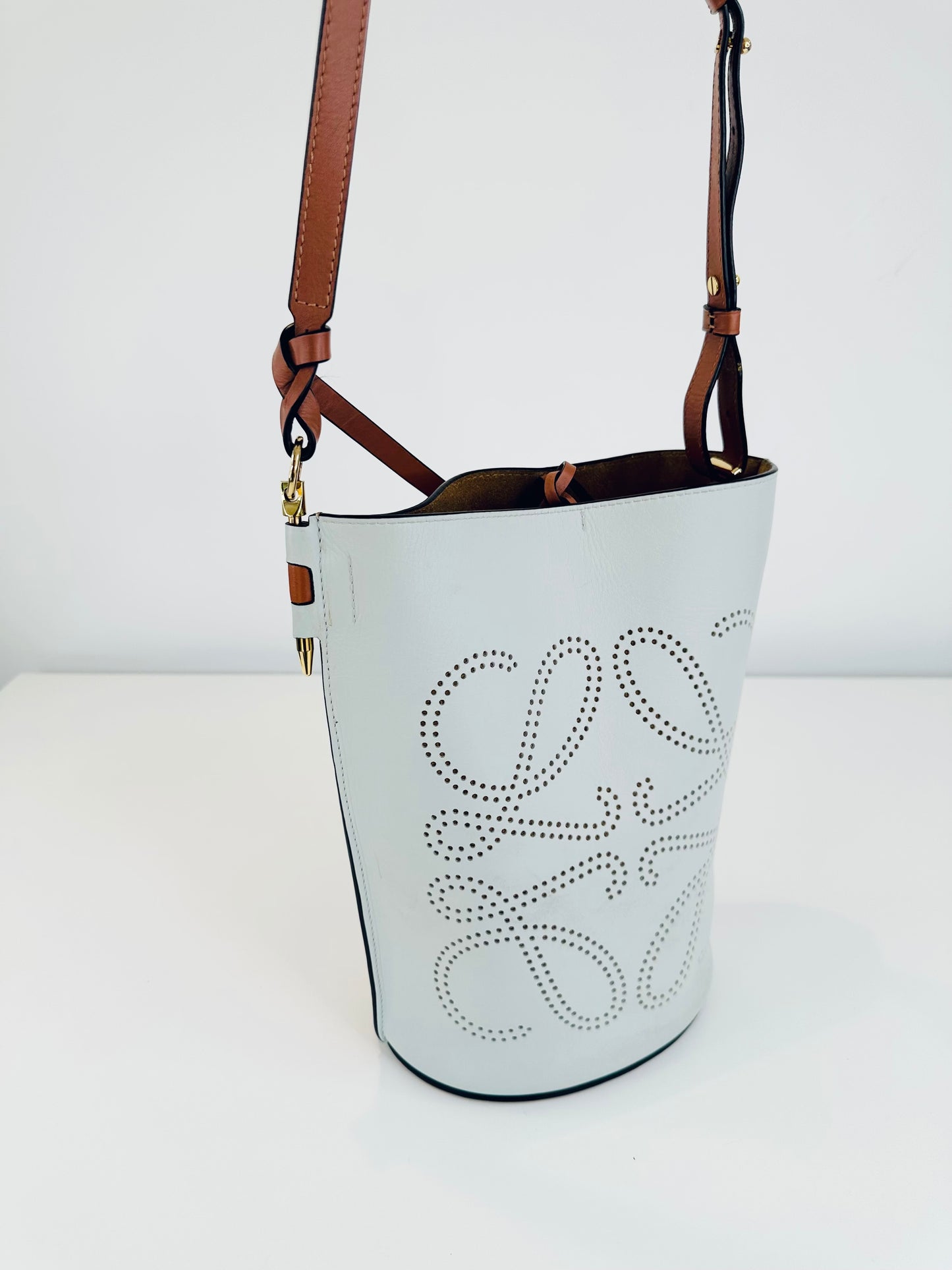 Gate Anagram Perforated Leather Bucket Bag