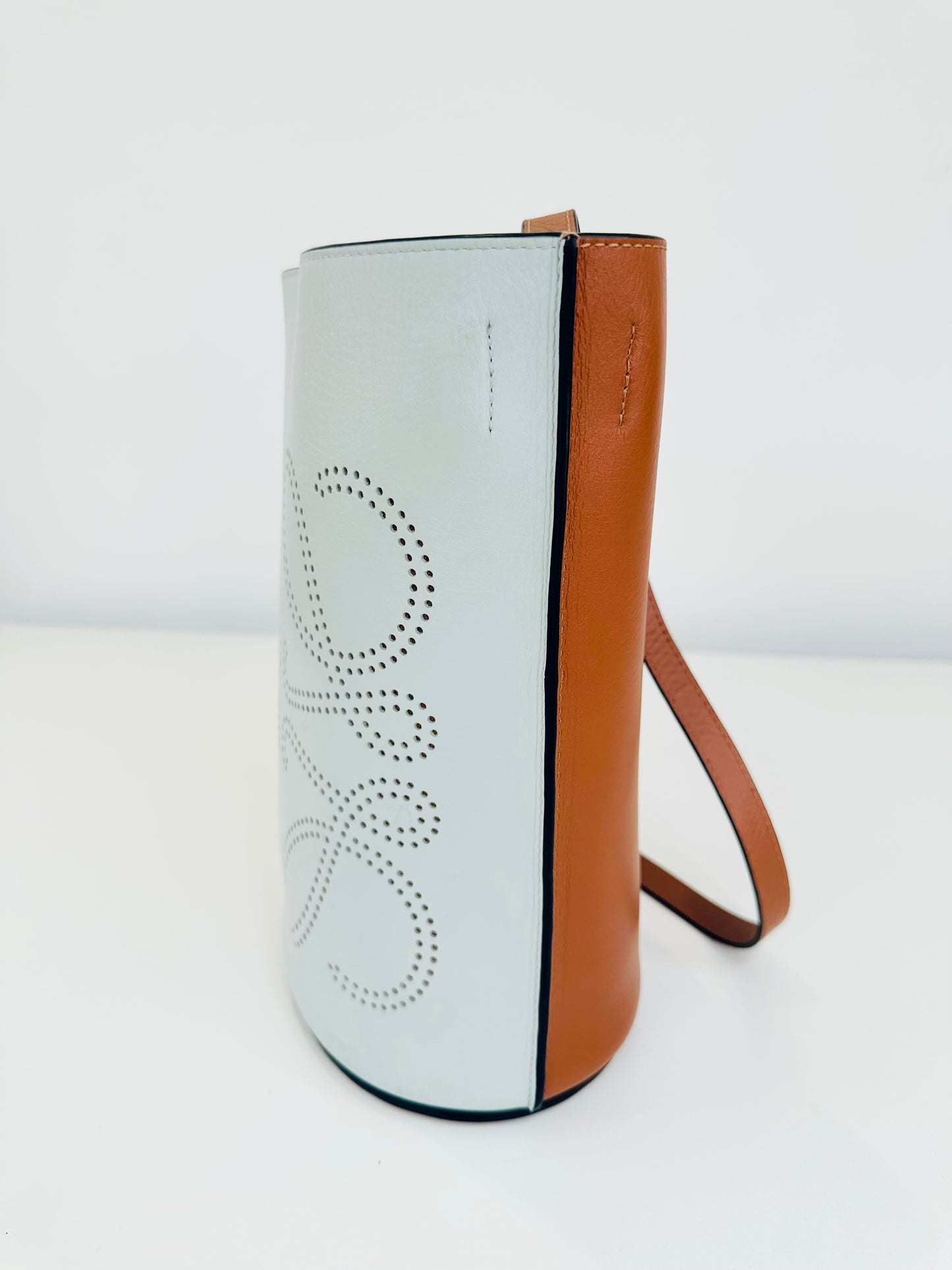 Gate Anagram Perforated Leather Bucket Bag