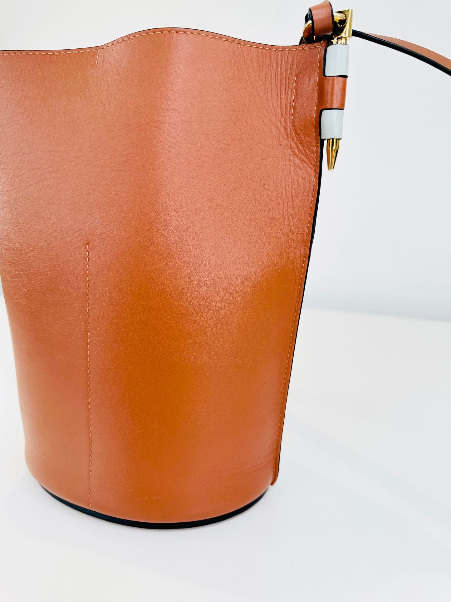 Gate Anagram Perforated Leather Bucket Bag