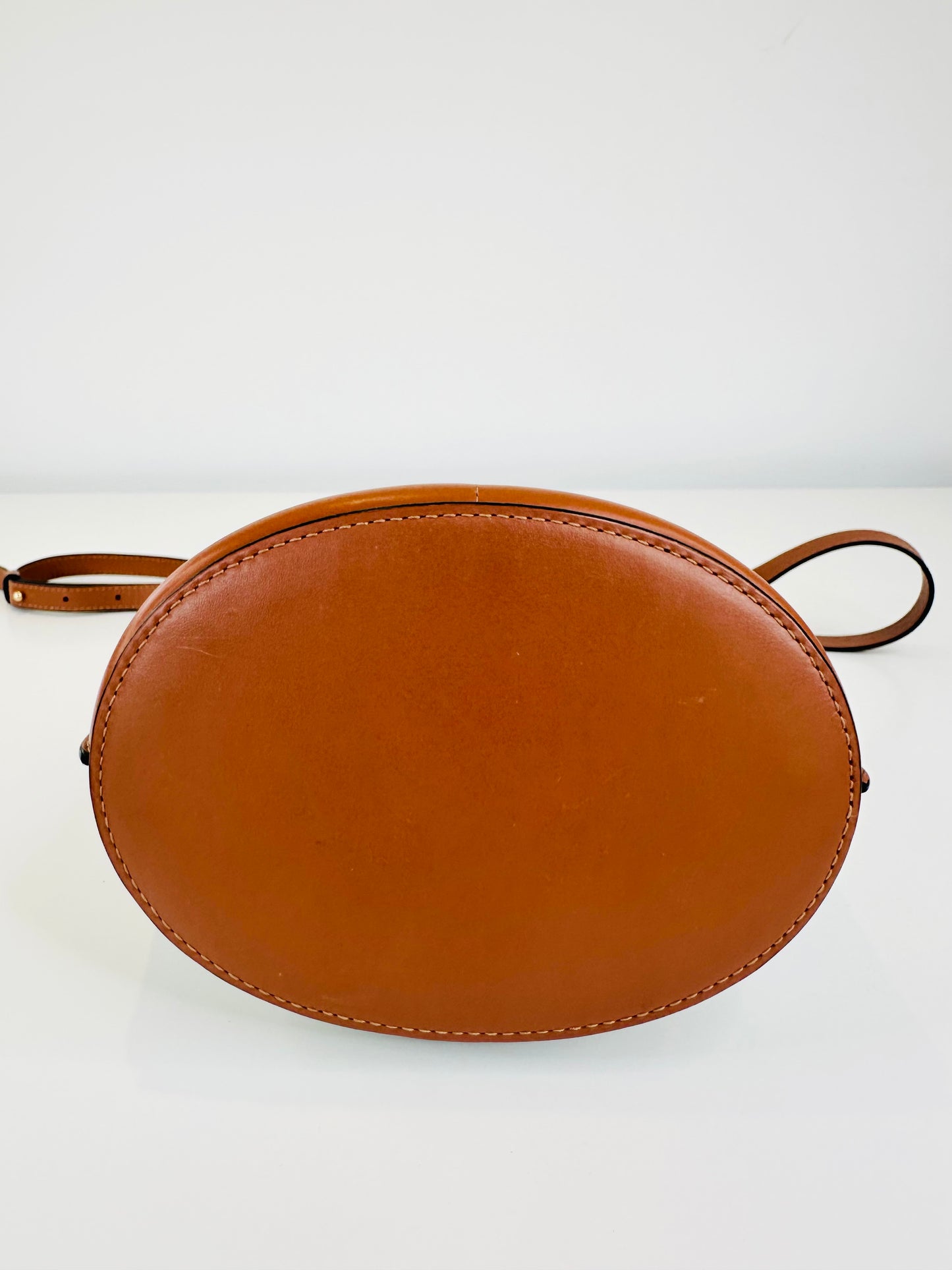 Gate Anagram Perforated Leather Bucket Bag