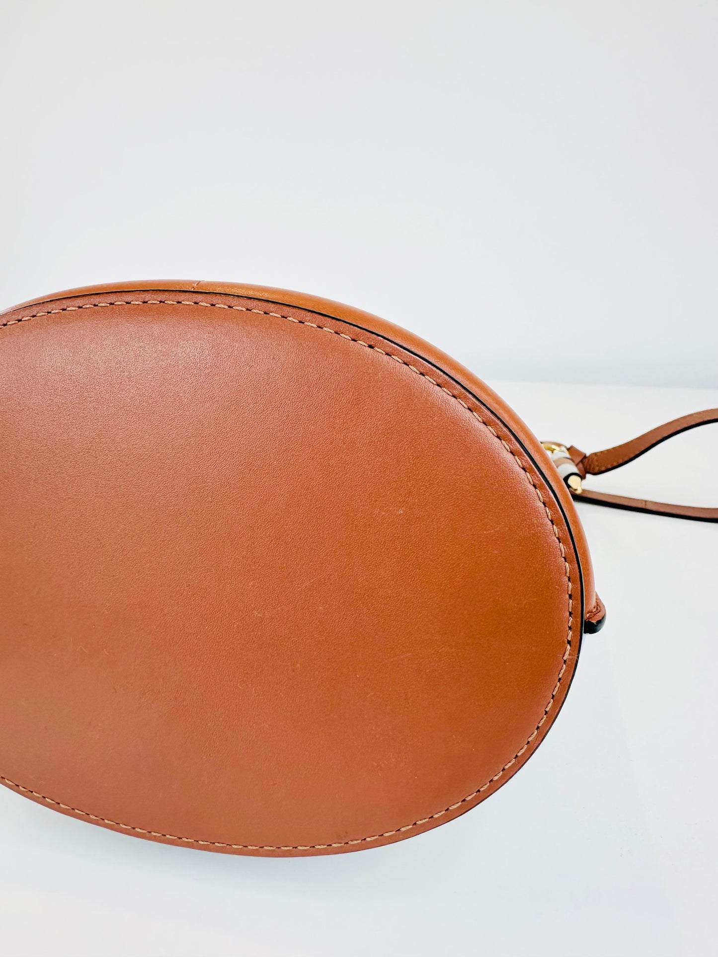 Gate Anagram Perforated Leather Bucket Bag