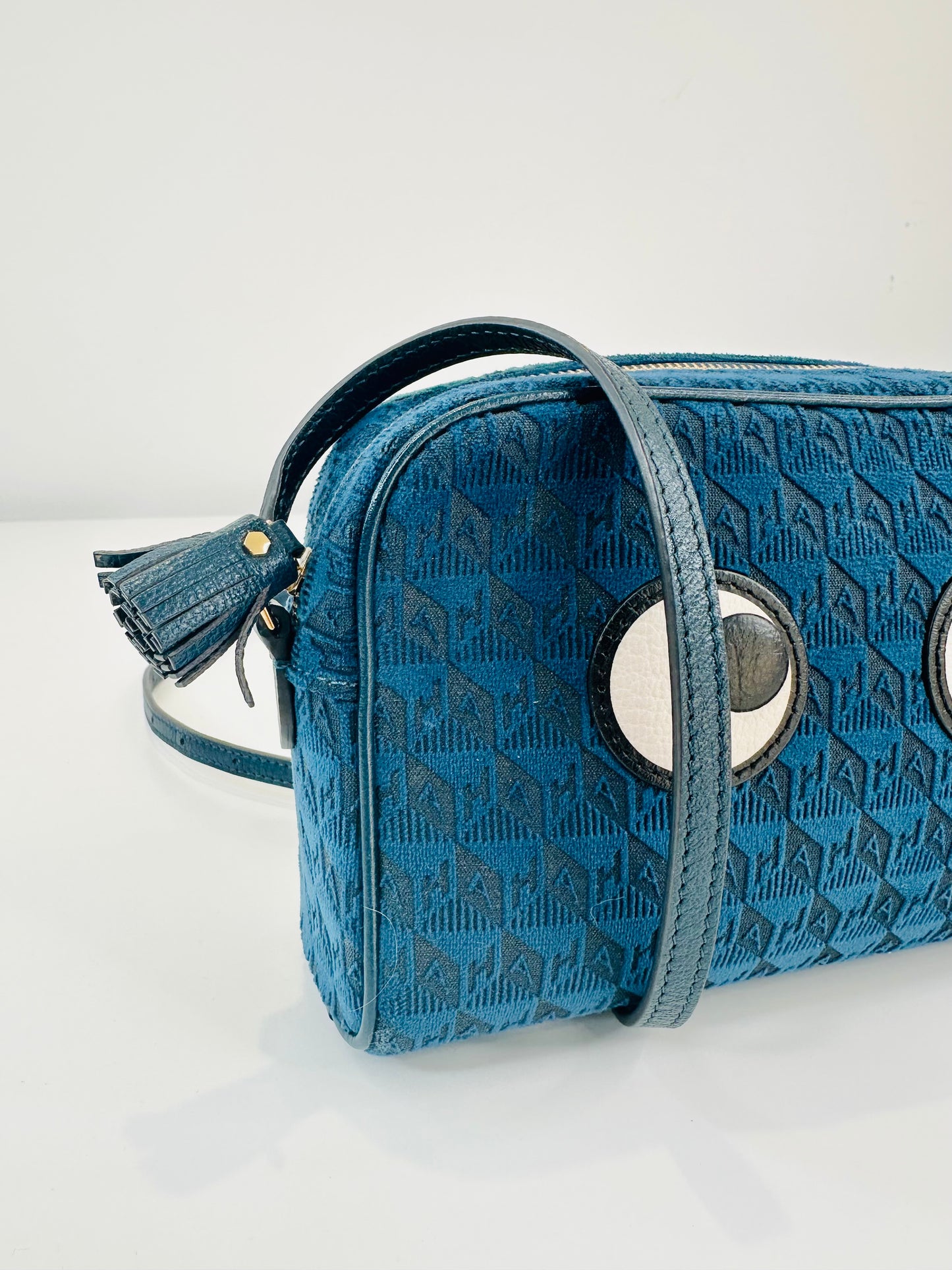 Velvet Eyes Crossbody Bag