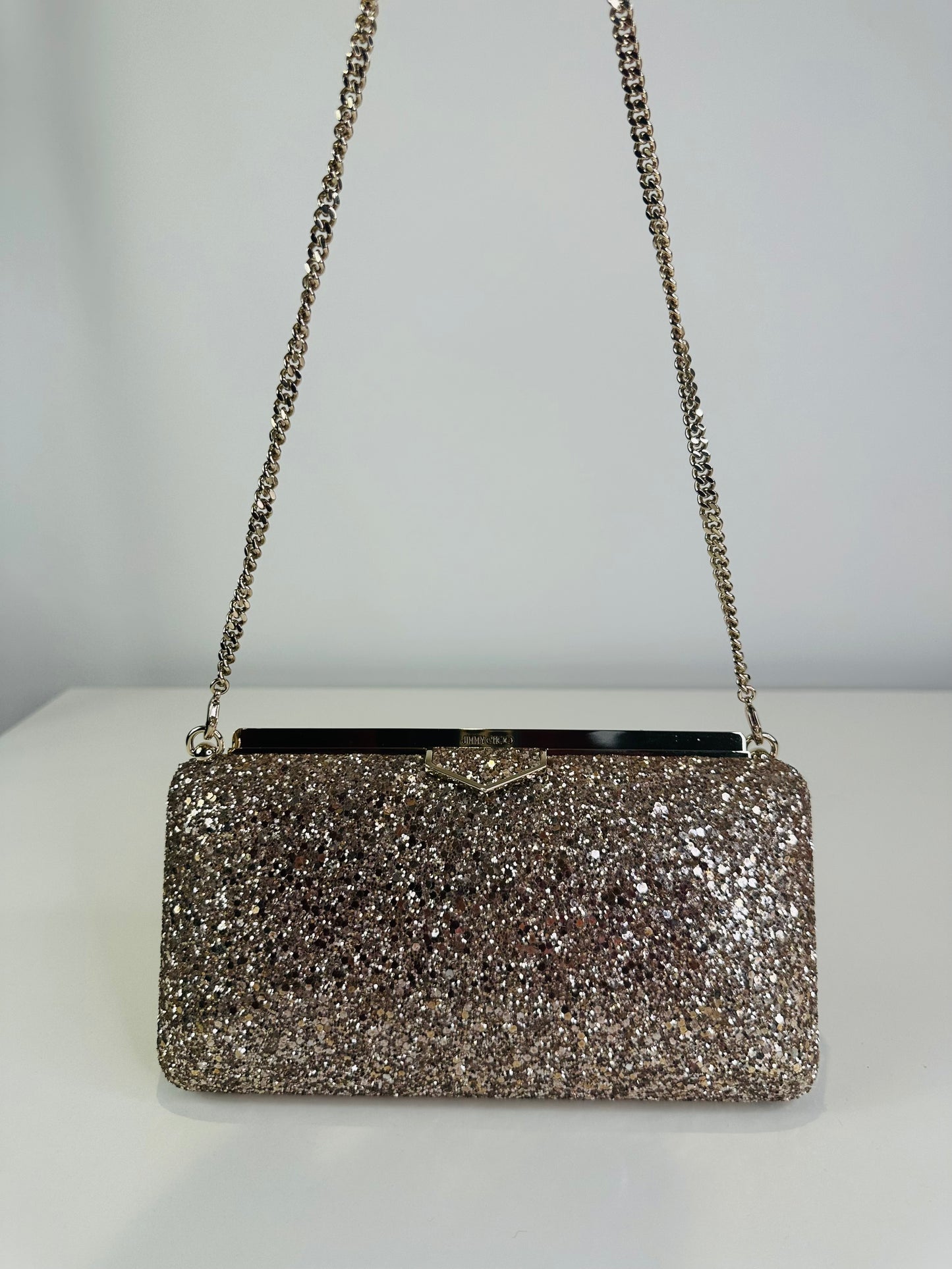 Ellipse Glitter Clutch